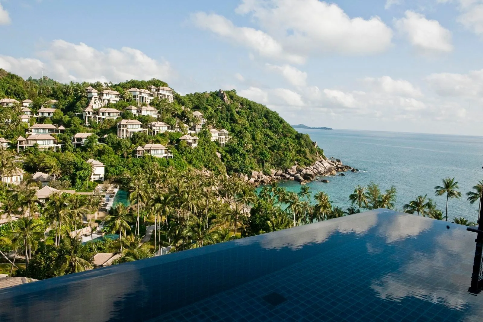 Banyan Tree Samui — aerial of the hillside resort and bay