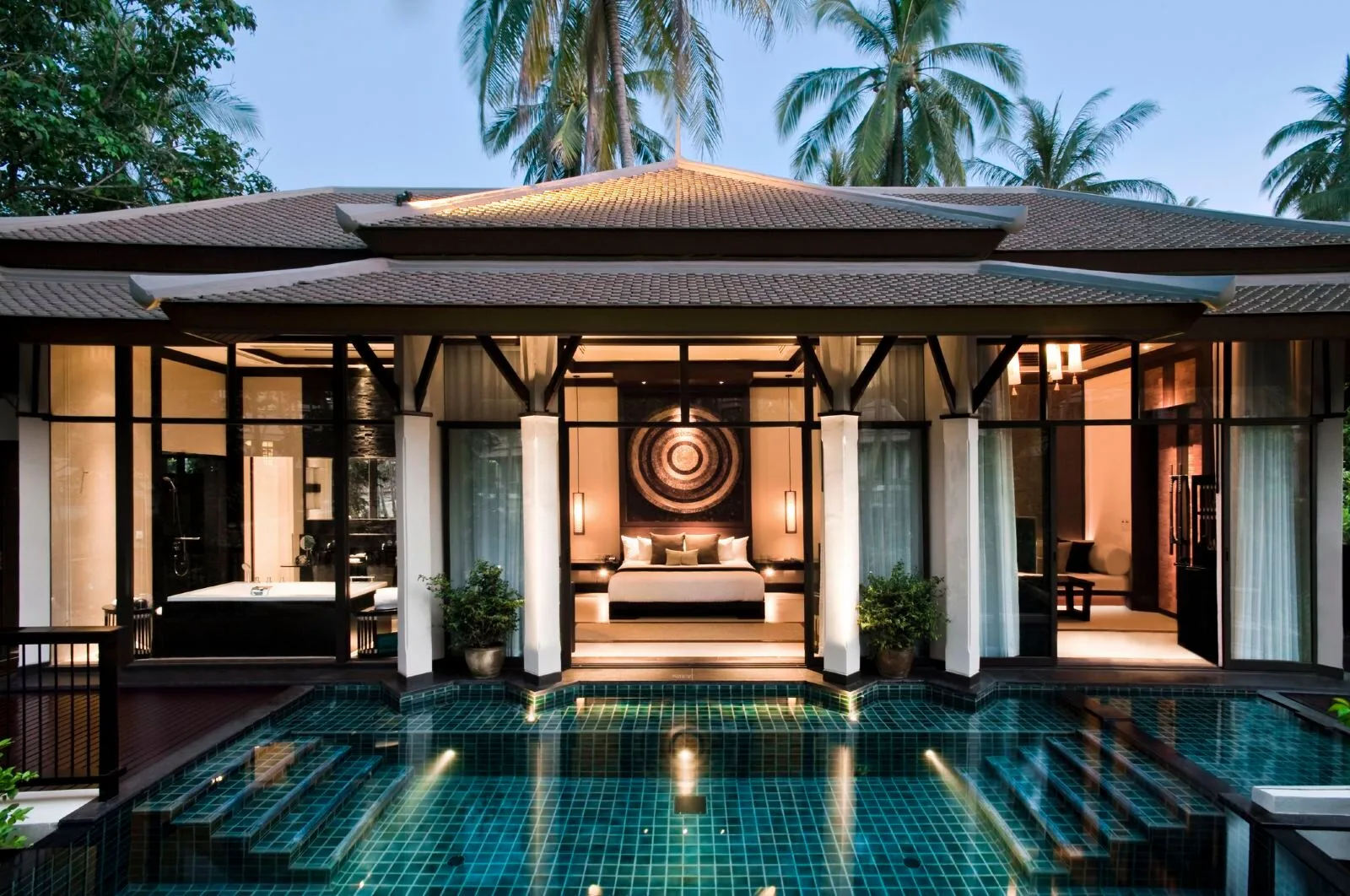 Banyan Tree Samui — open-air sala pavilion beside a pool