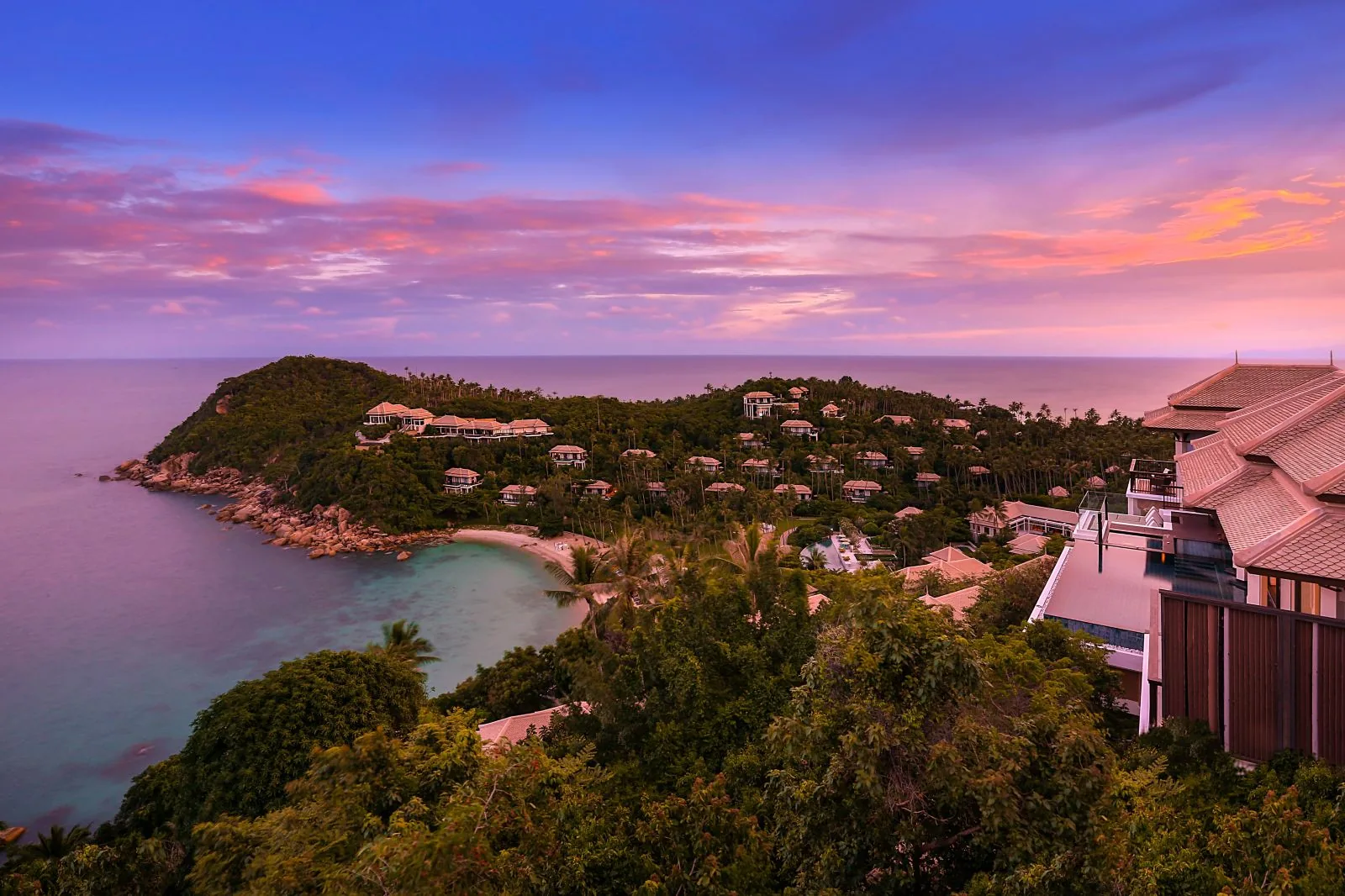 Banyan Tree Samui — the hillside resort at dusk over the Gulf