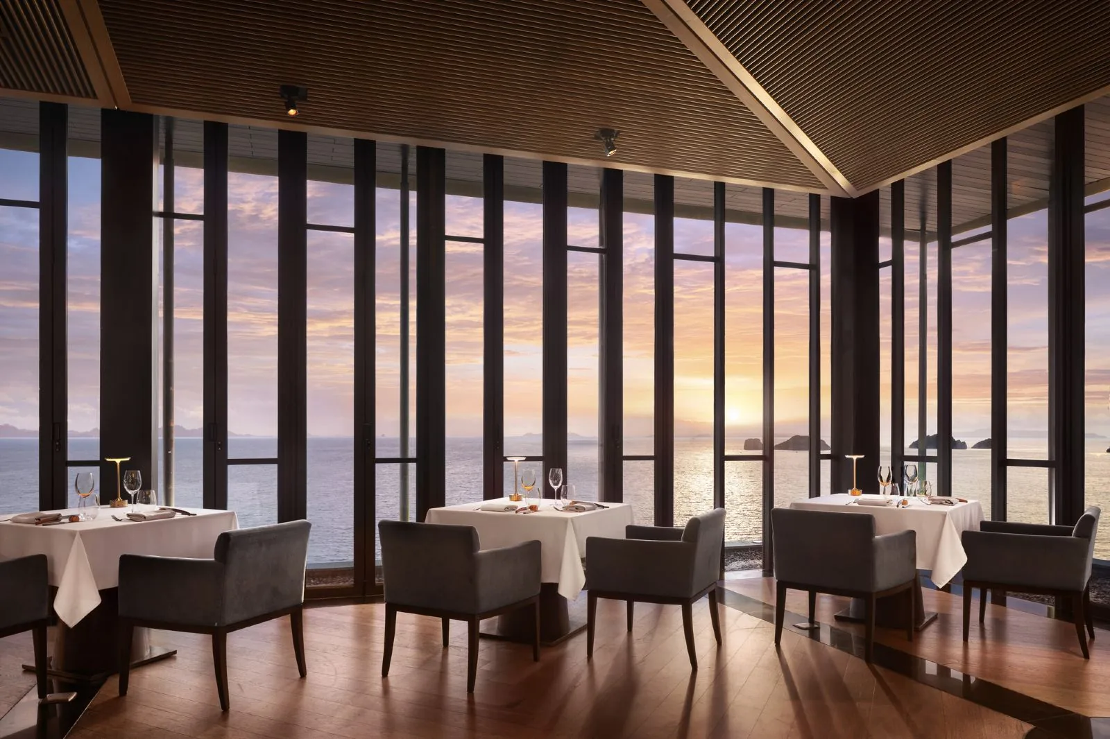 Conrad Koh Samui — restaurant with floor-to-ceiling sea views