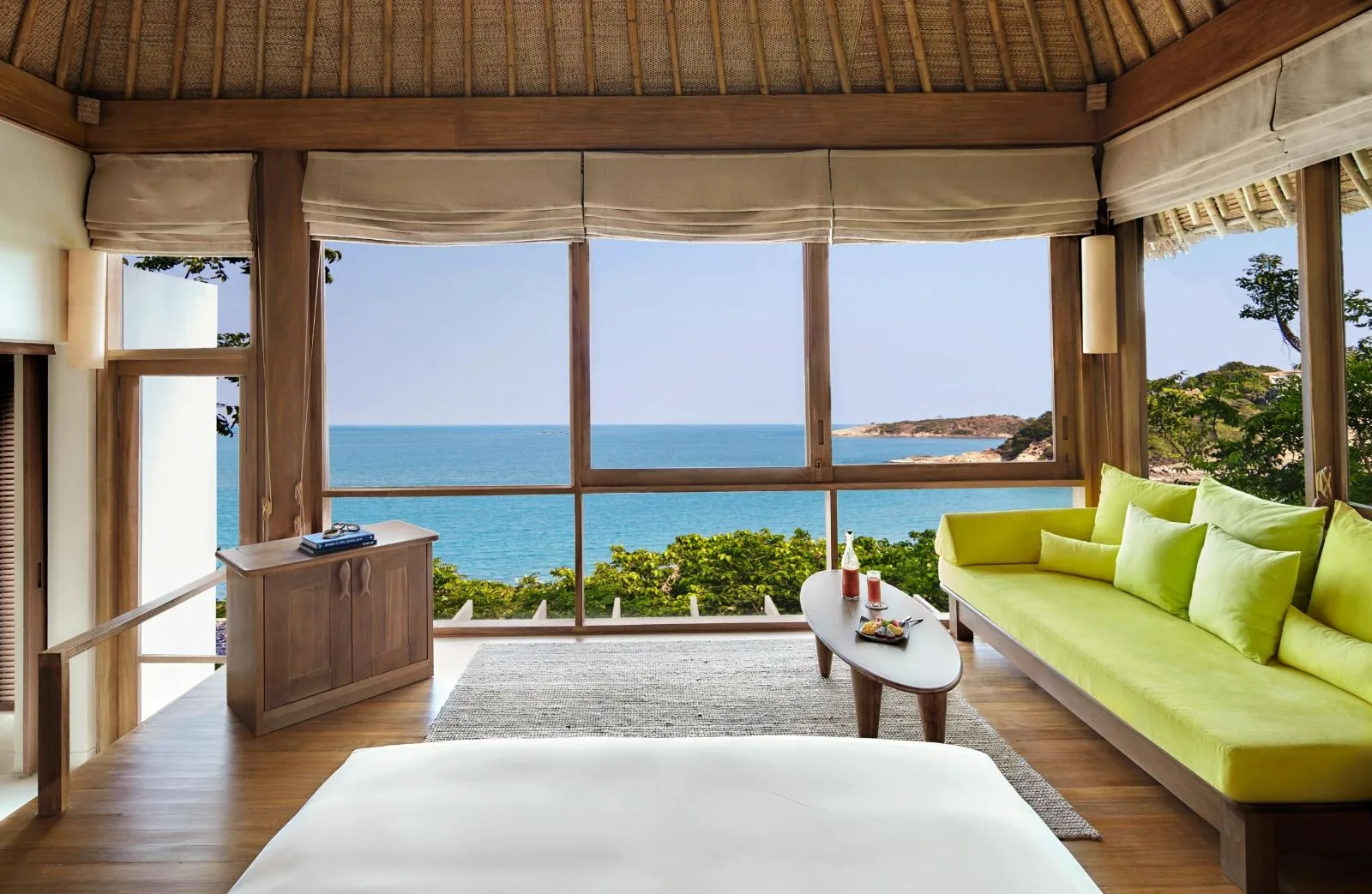 Six Senses Samui — open-sided living pavilion beside a private pool